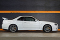 2002 Nissan SKYLINE GT-R BNR34 R34 Skyline GT-R V-Spec 2 Nür, Exterior Color White -QM1-, Nismo S-Tune Suspension