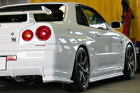 1999 Nissan SKYLINE GT-R R34 GT-R Nismo Side Skirts, Trust Air Clean, Ganador Muffler, Aragosta Adjustable Height Coilovers 