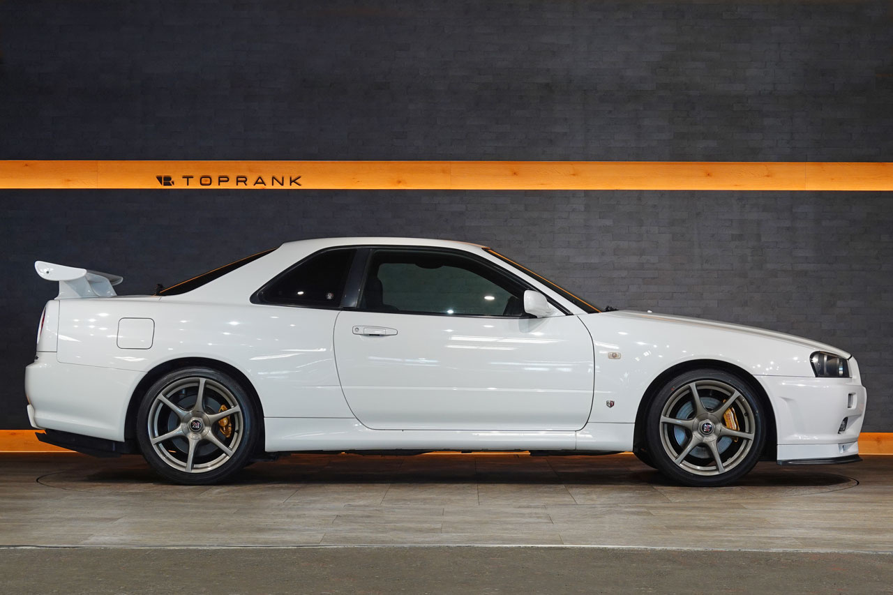 2002 Nissan SKYLINE GT-R BNR34 R34 Skyline GT-R V-Spec 2 Nür, Exterior Color White -QM1-, Nismo S-Tune Suspension