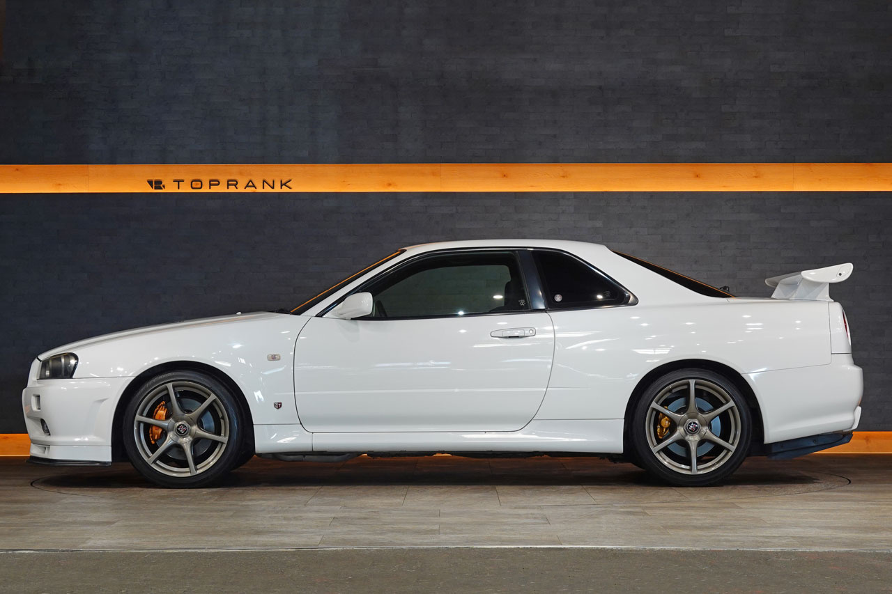 2002 Nissan SKYLINE GT-R BNR34 R34 Skyline GT-R V-Spec 2 Nür, Exterior Color White -QM1-, Nismo S-Tune Suspension